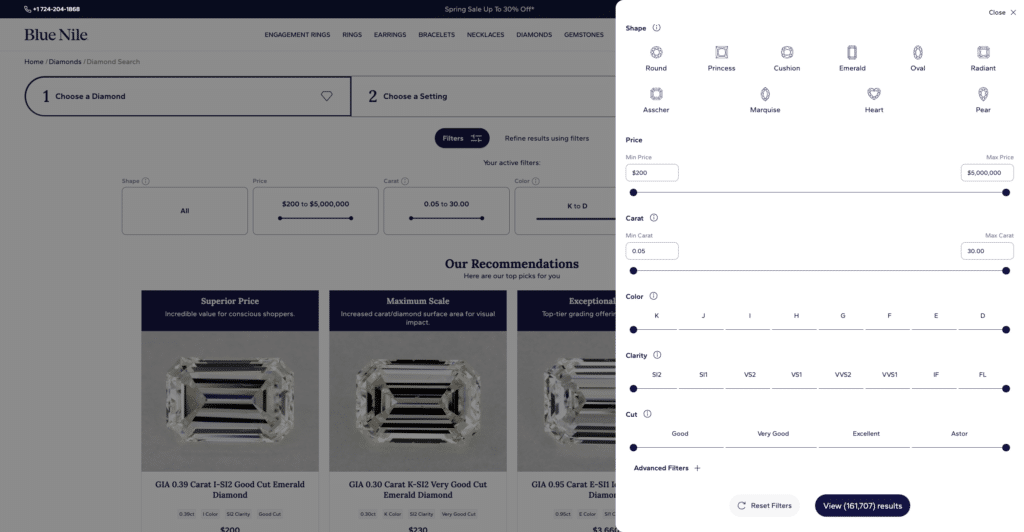 A detailed screenshot of the Blue Nile website diamond search interface from early 2026, showcasing both the search filter panel and a newly integrated 'Our Recommendations' algorithm section. The right-hand filter panel is open, displaying a wide range of standard sliders for Shape, Price ($200 to $5,000,000), Carat, Color (K to D), Clarity (SI2 to FL), and Cut (from 'Good' to 'Astor'). Behind the panel, three algorithm-chosen 'top picks' are visible under titles like 'Superior Price' and 'Maximum Scale.' These recommendations feature GIA-certified diamonds (e.g., GIA 0.39 Carat I-SI2 Good Cut Emerald and GIA 0.30 Carat K-SI2 Very Good Cut Emerald). This visual audit highlights the specific low-performance 'factory cut' traps—such as GIA Good and Very Good Cut grades on emerald diamonds—that educated buyers must bypass using the 'Advanced Filters' hacking strategy.