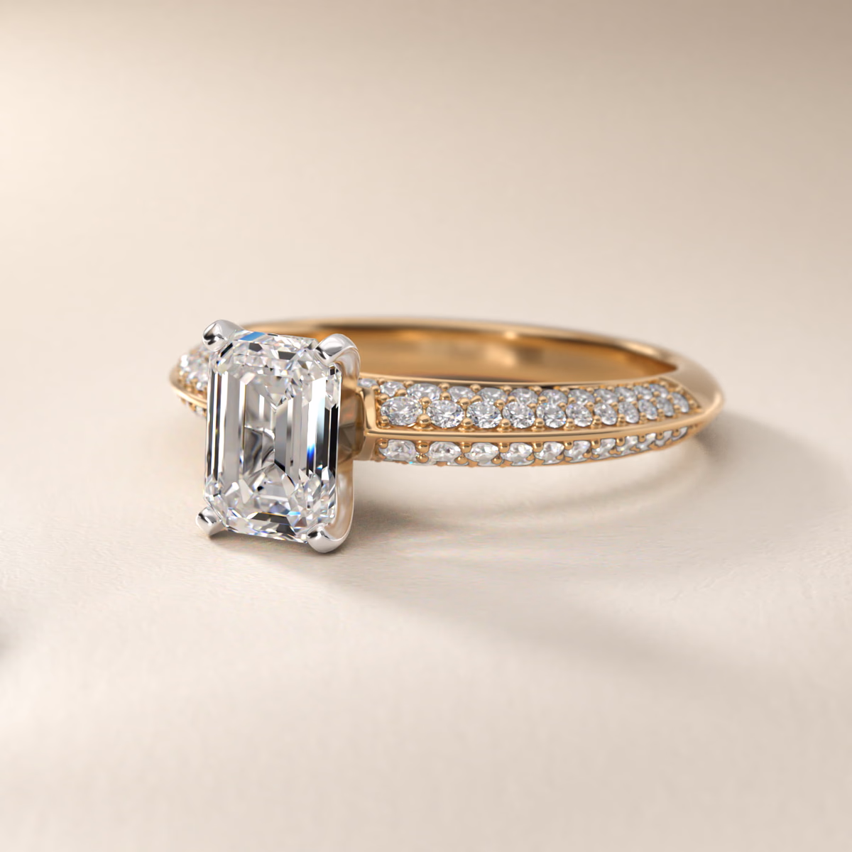 Vintage emerald cut diamond ring in yellow gold — step-cut geometry with Art Deco setting language