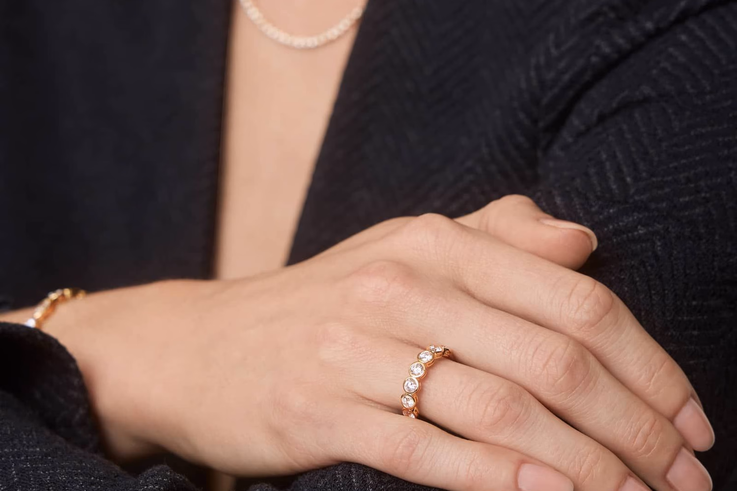 Blue Nile Riviera Pavé anniversary ring in yellow gold lifestyle