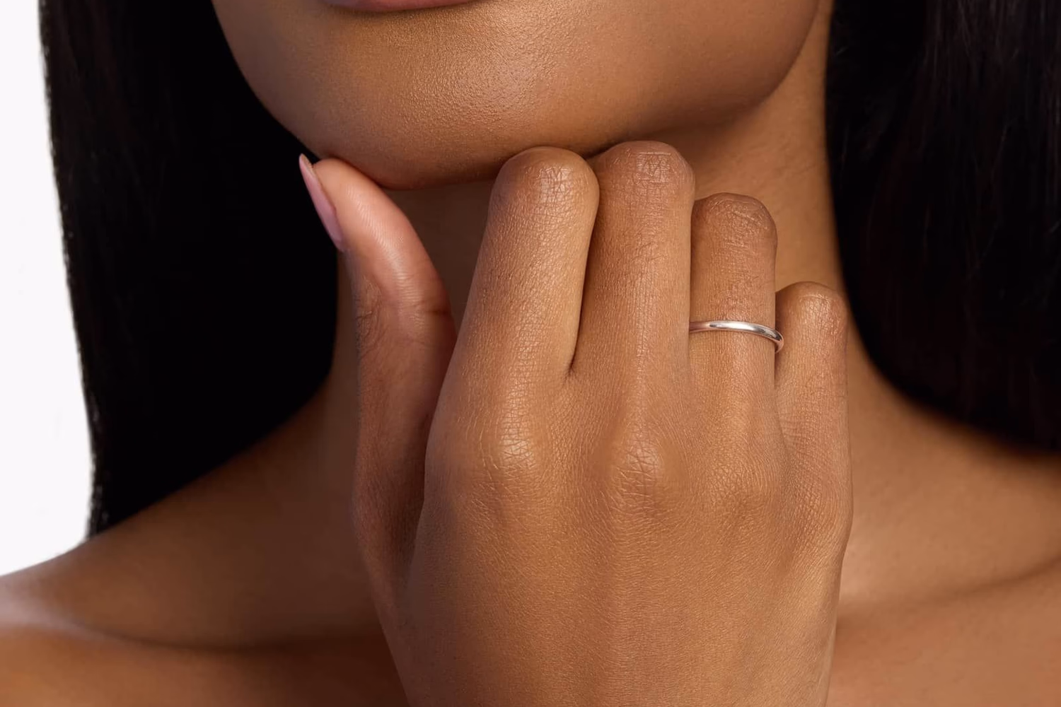 Blue Nile Classic Wedding Band in 14K Rose Gold — warm rose gold band on hand