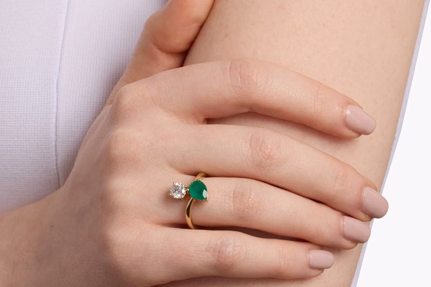 Emerald cut emerald and diamond ring in 14K yellow gold