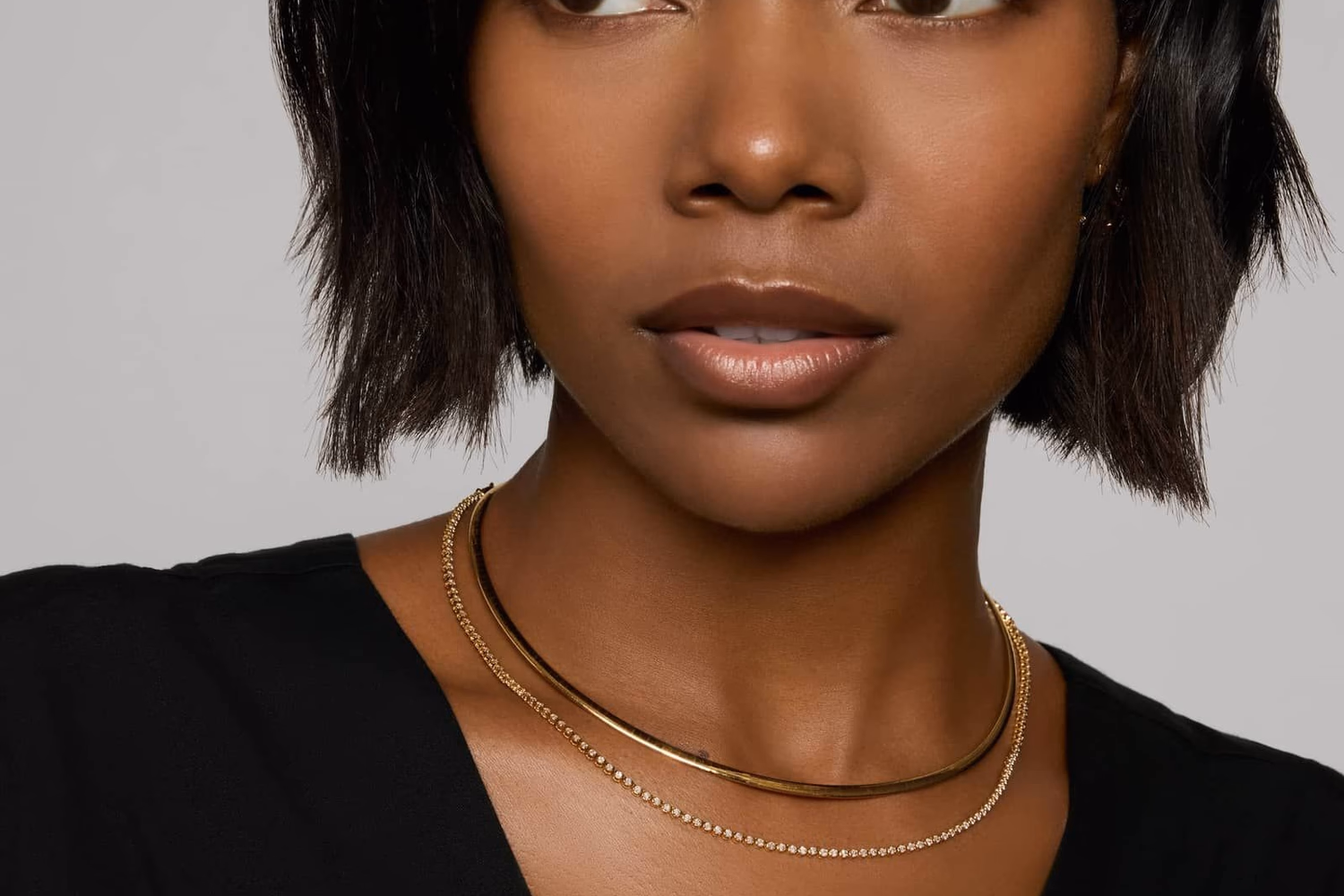 Blue Nile Mini Diamond Pendant layered with tennis necklace in 14K yellow gold — everyday diamond layering look, necklace stack styling