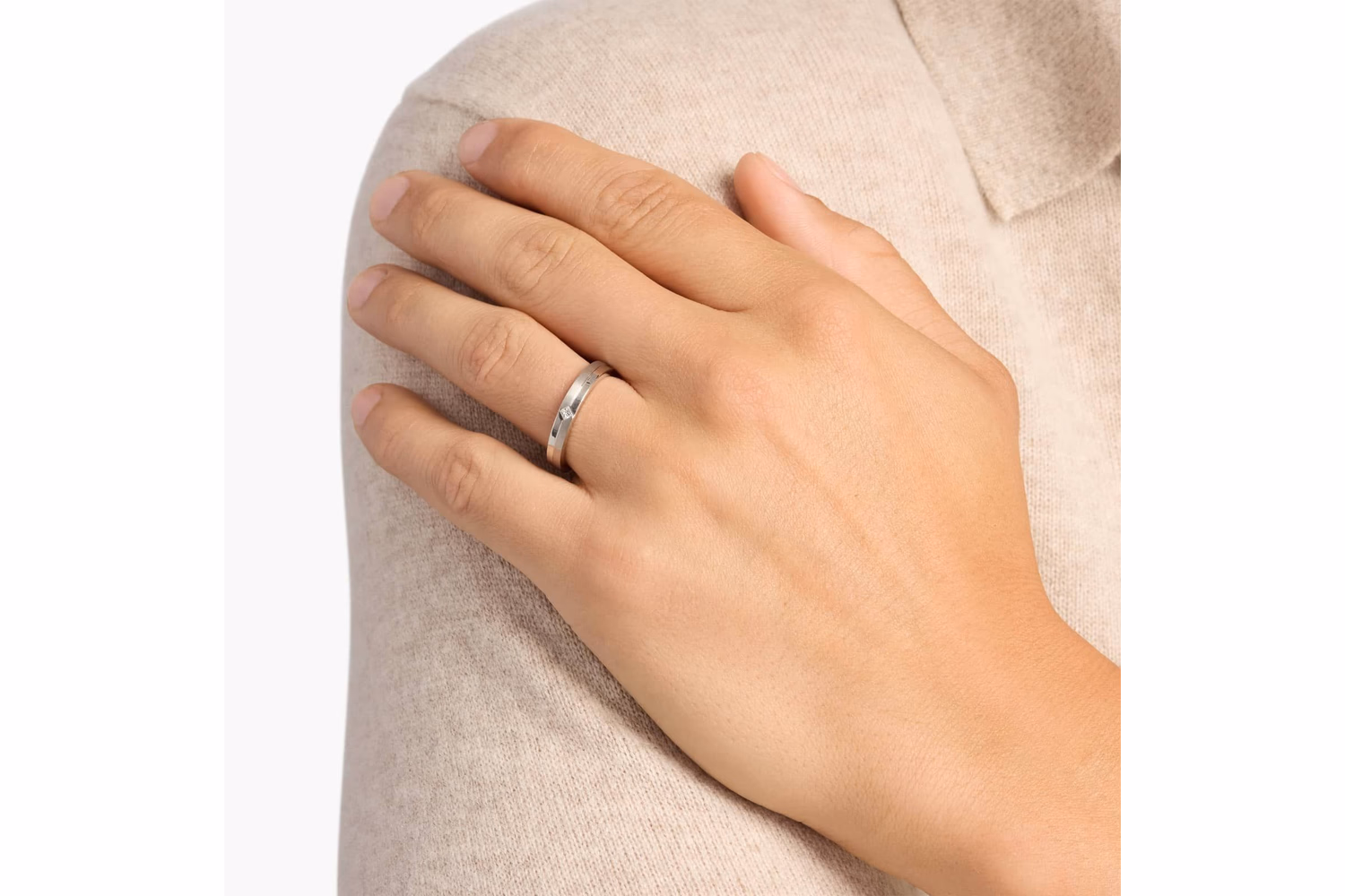 Men's channel set princess cut diamond ring in white gold — angle view showing band width and profile