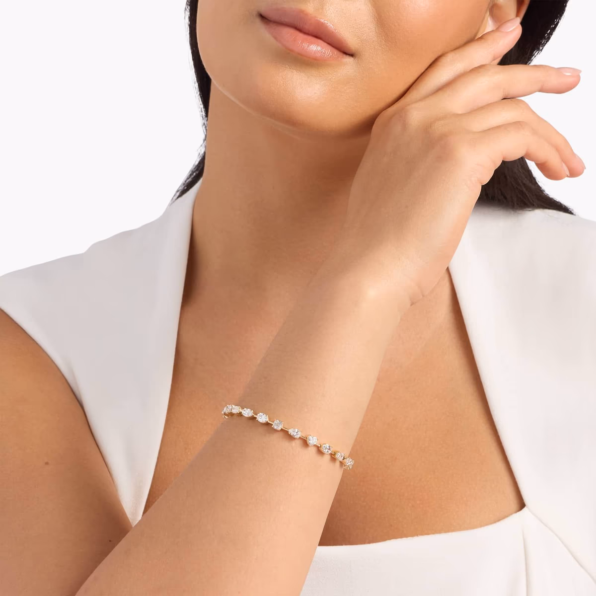 Blue Nile pear diamond bracelets — station, tennis, bangle and accent styles