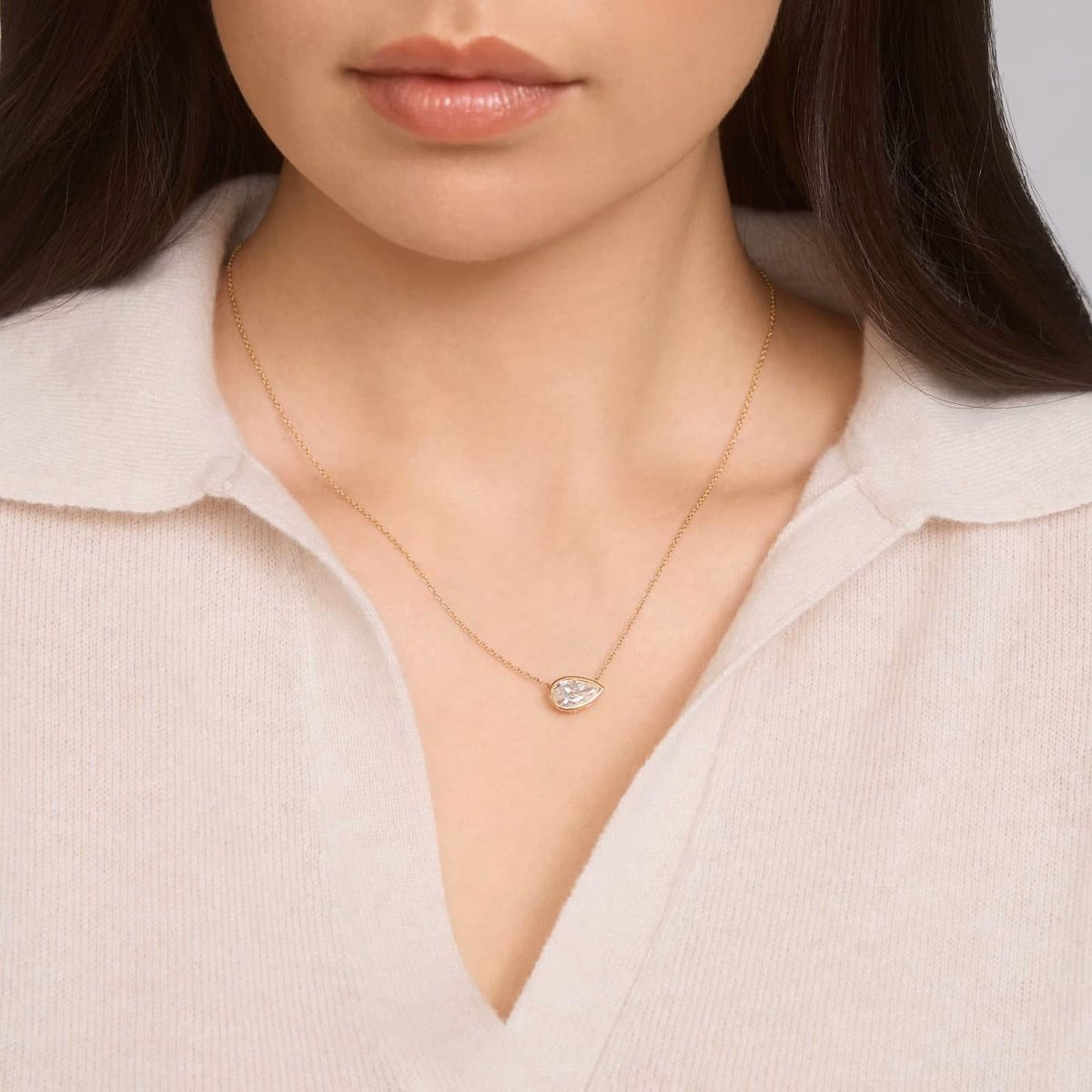 Shop the Look — point up pear diamond pendant in yellow gold lifestyle shot