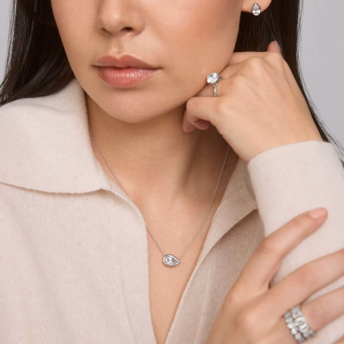 Pear diamond pendant gold — yellow gold solitaire lifestyle