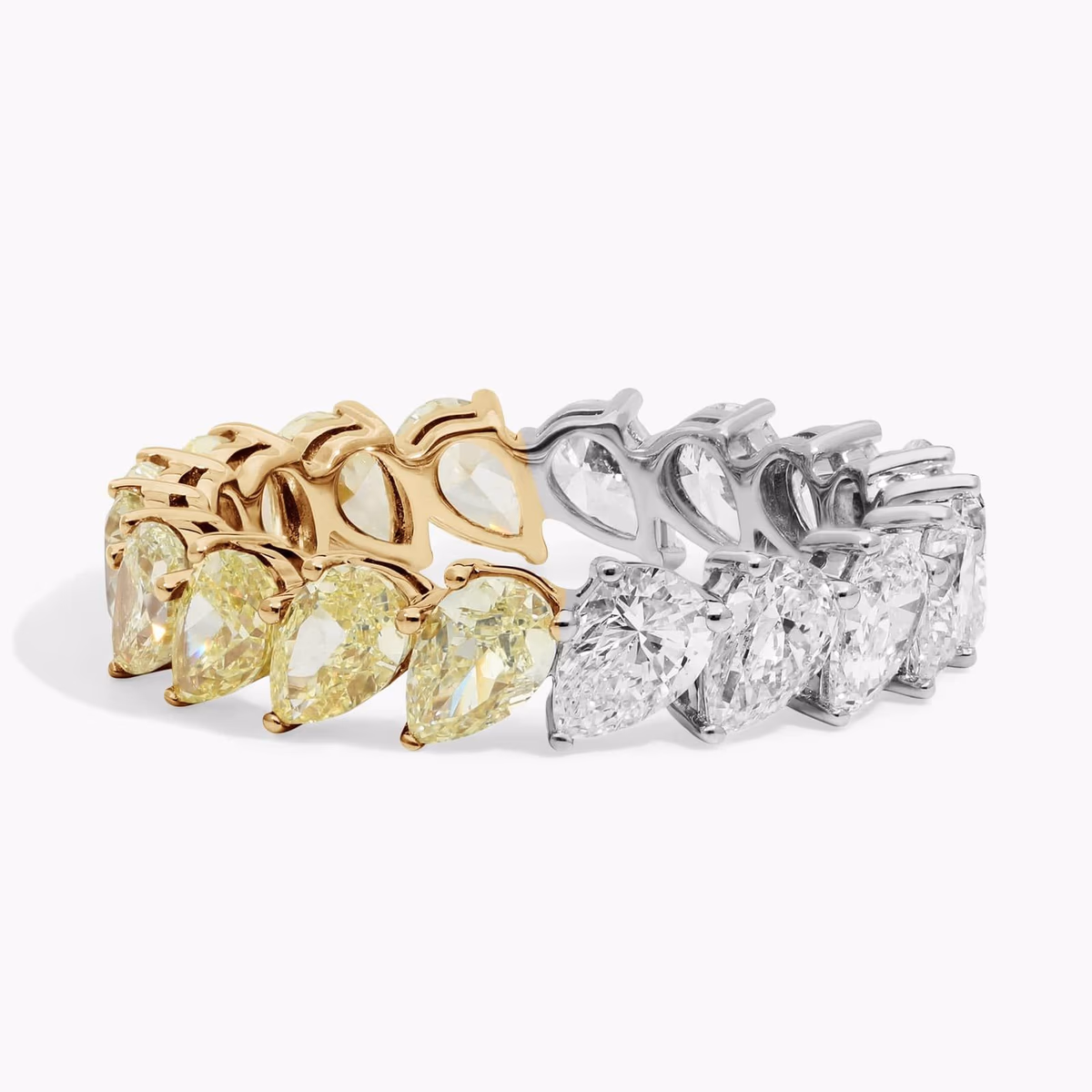 East-West 9-Stone Pear Diamond Anniversary Ring and pear diamond band styles at Blue Nile