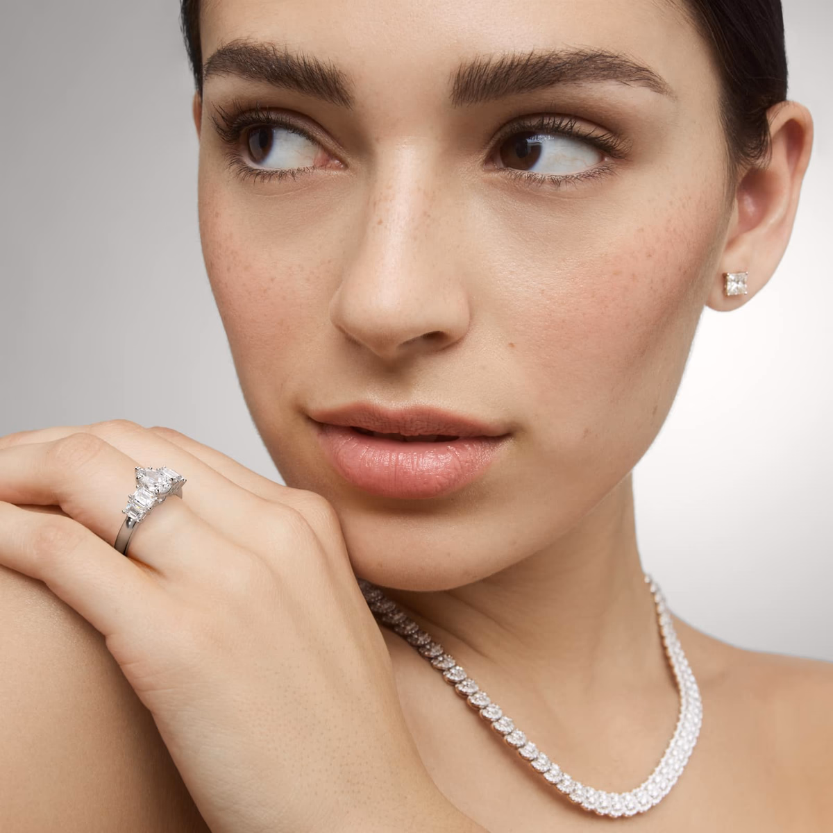 White gold pear diamond ring — pavé shank style
