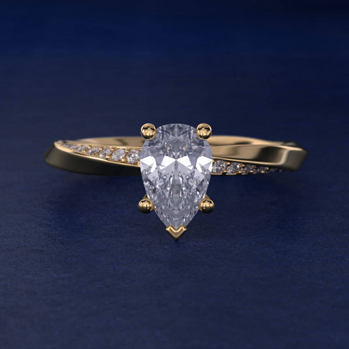 Yellow gold pear diamond ring — halo style