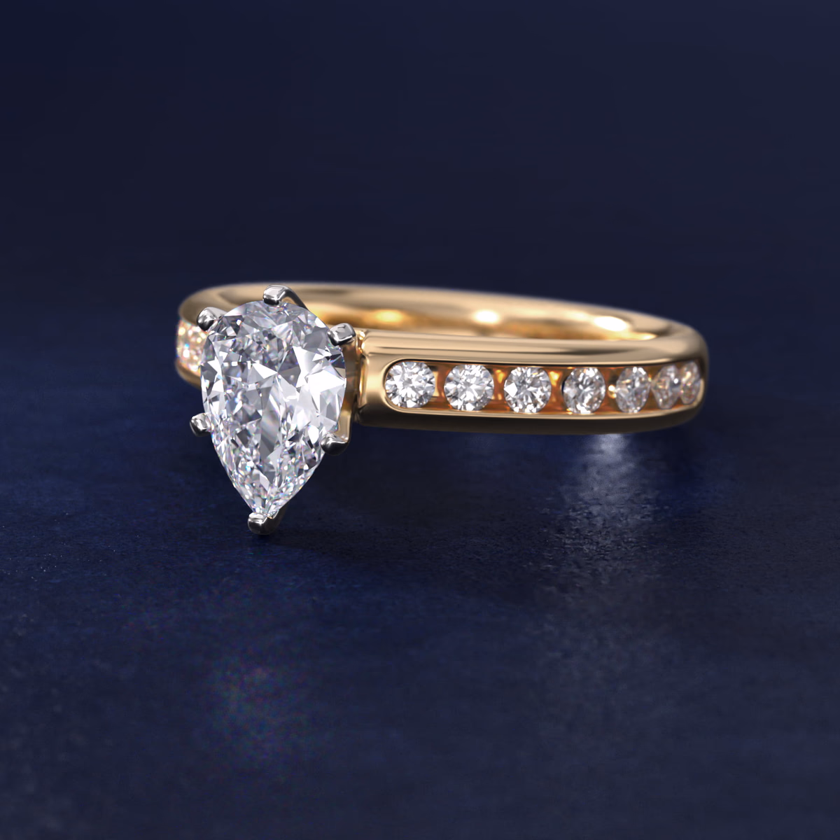Yellow gold vintage pear diamond ring — milgrain style