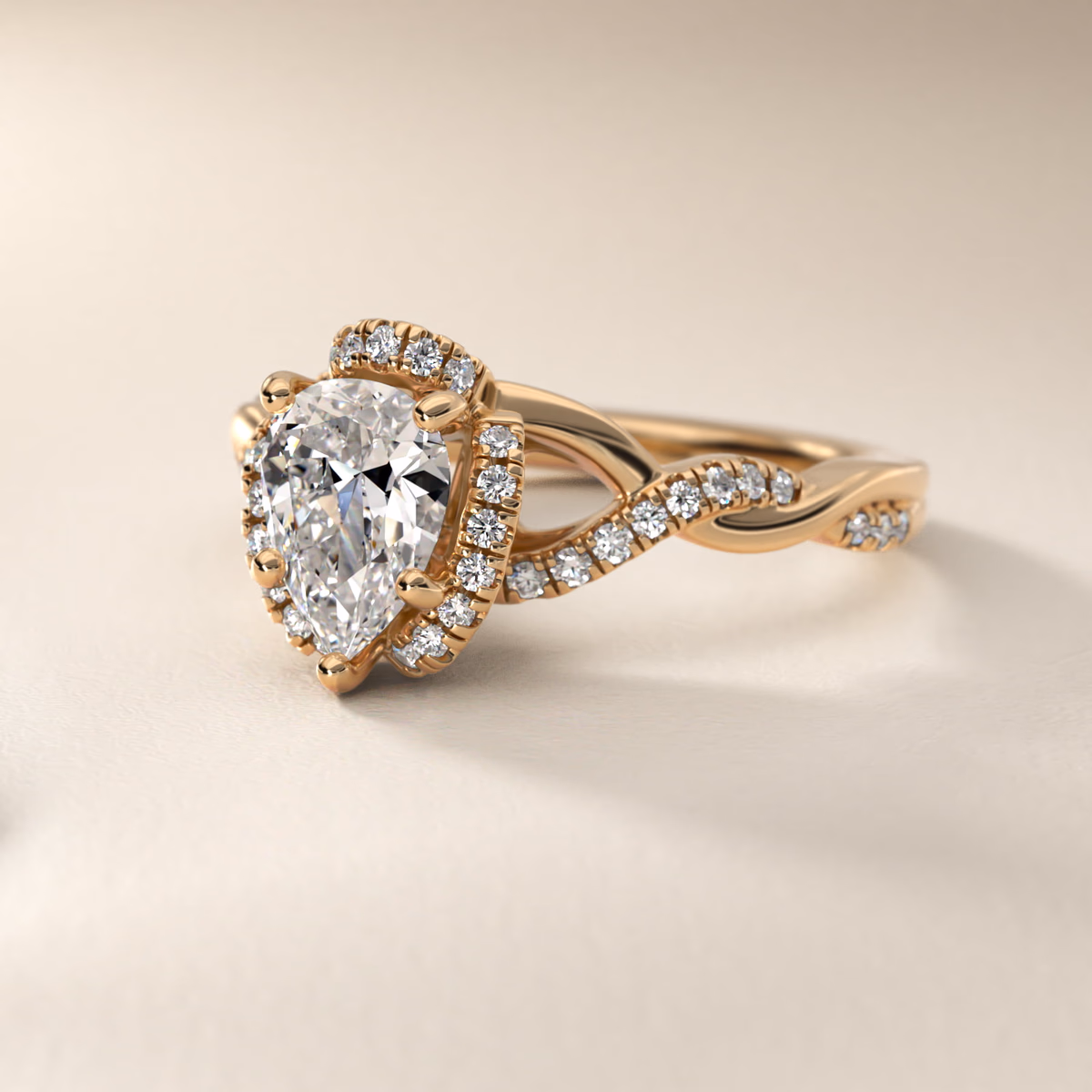Yellow gold pear diamond ring with wedding band pairing