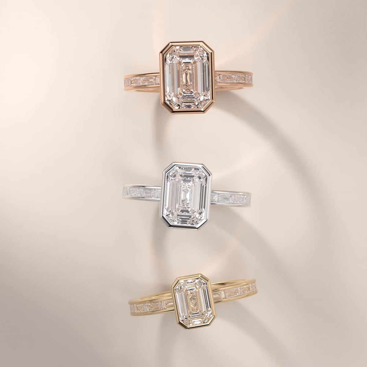 Comfort fit bezel solitaire emerald cut diamond ring in white gold, showing the step-cut stone enclosed in the smooth metal collar on a hand