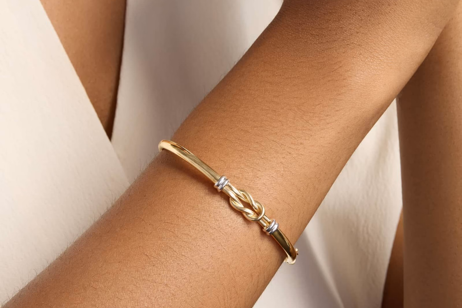 Diamond bangle bracelet in 14k white gold on wrist, Blue Nile lifestyle photo