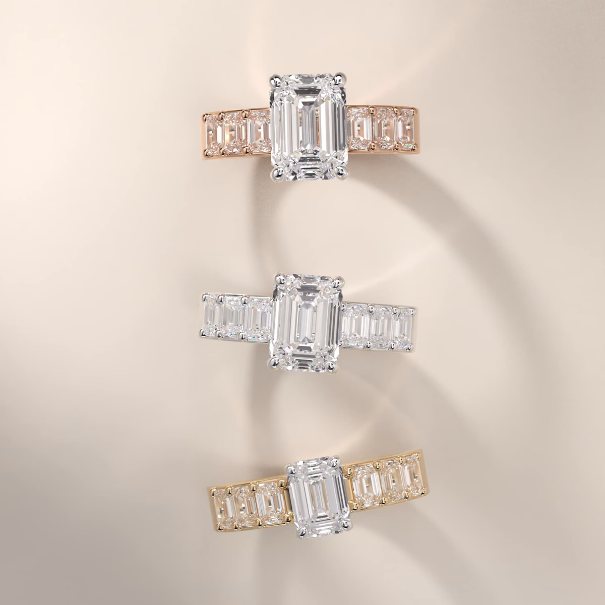 Emerald cut diamond ring in yellow gold with prong solitaire setting