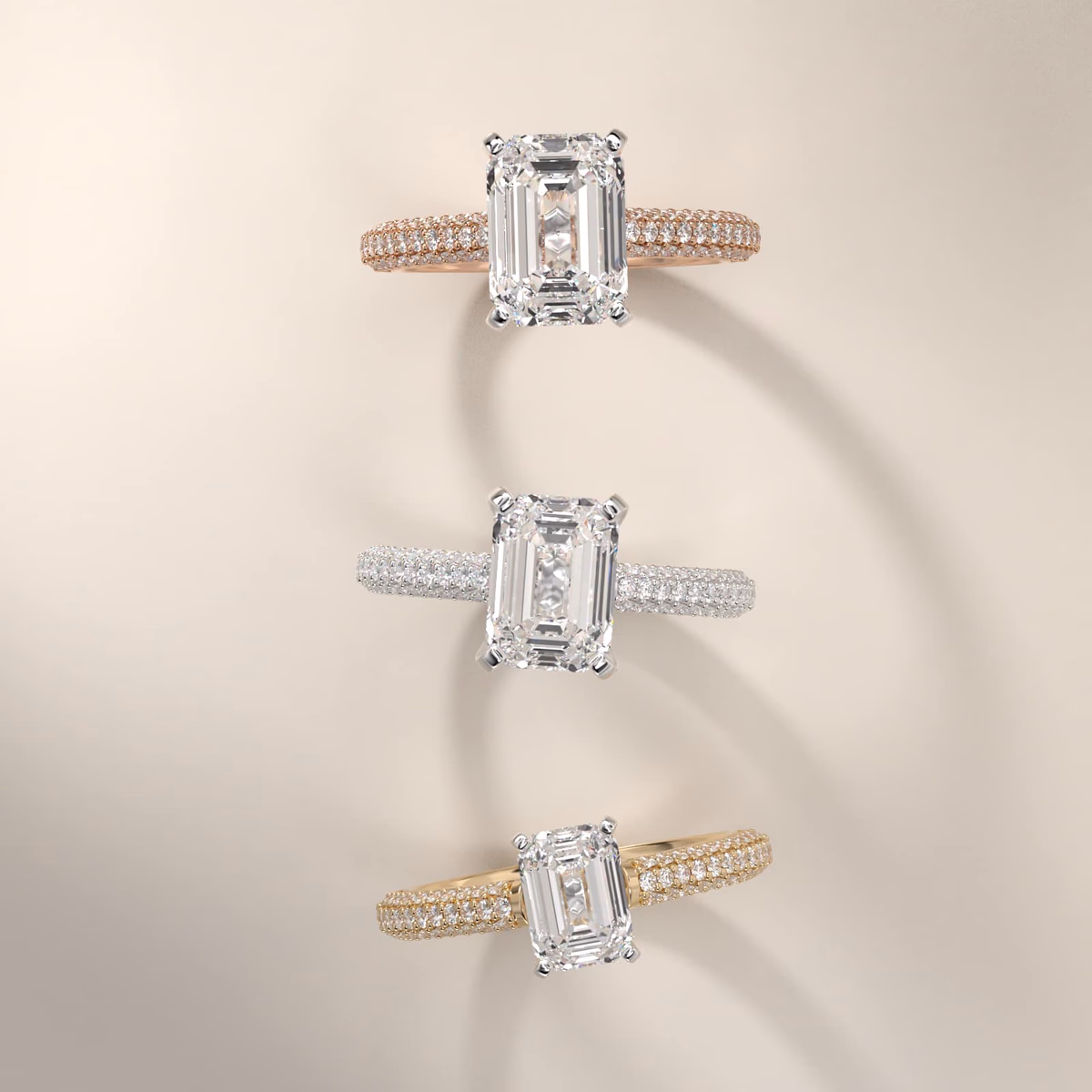 Emerald cut diamond solitaire ring in yellow gold tapered setting