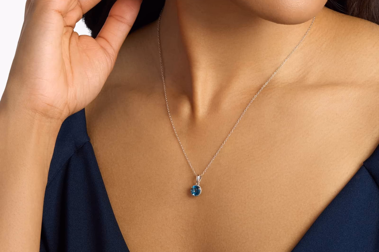 Blue Nile sterling silver gemstone halo pendant necklace lifestyle photo