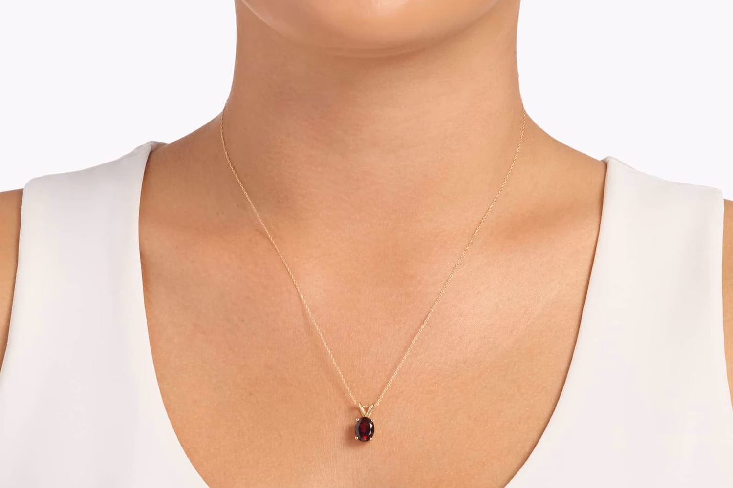Blue Nile James Allen 14K yellow gold birthstone necklace lifestyle photo on model