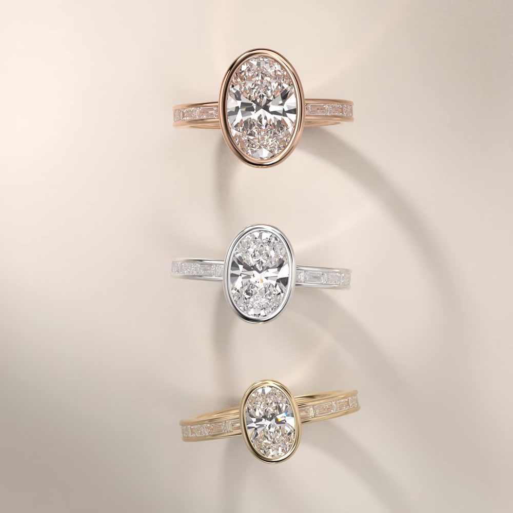 Oval diamond bezel solitaire setting in white gold