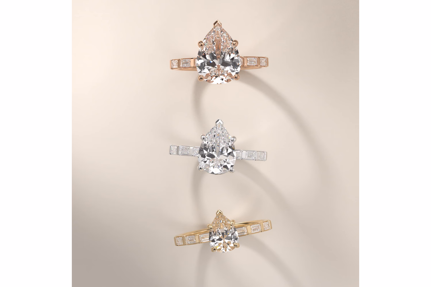 Pear diamond engagement ring with pavé shank in white gold — micro-set accent diamonds running along the band