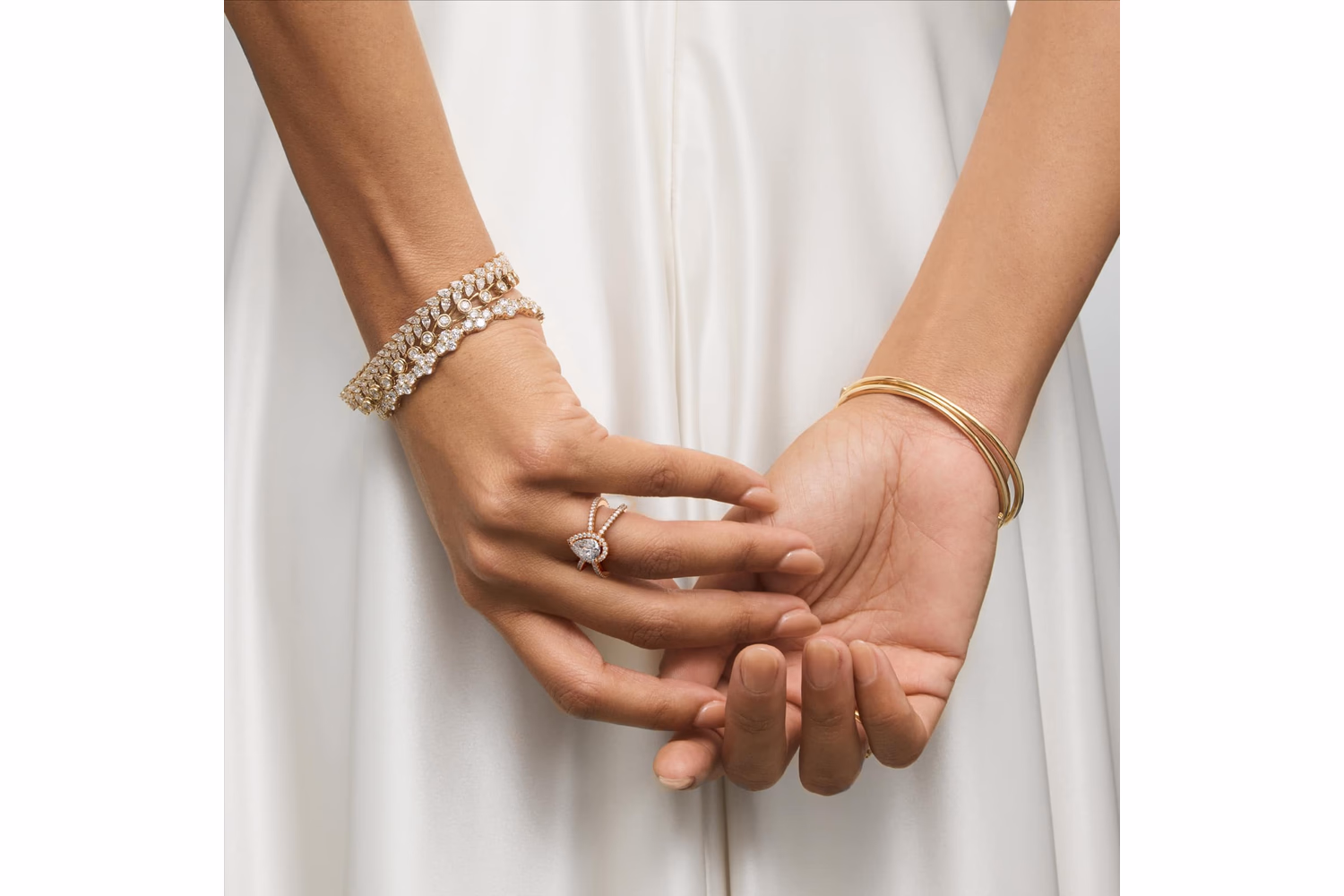 Pear diamond halo ring in rose gold — SuperImpose lifestyle view, Diamond Critics