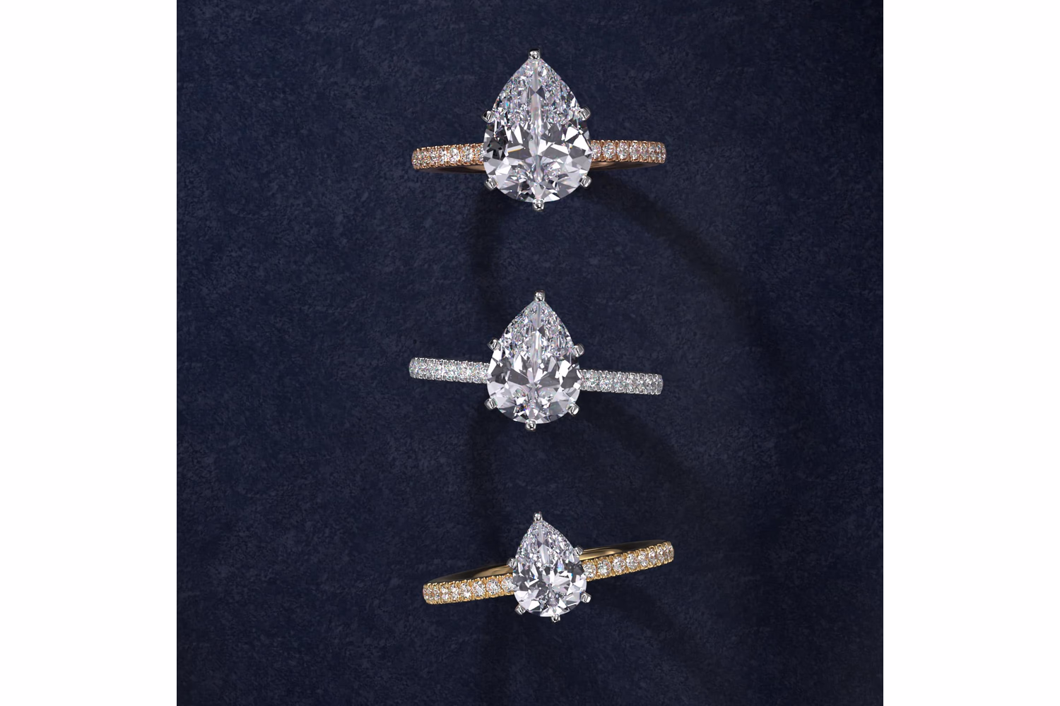 Pear shaped diamond ring in white gold solitaire setting — classic four prong design on Blue Nile