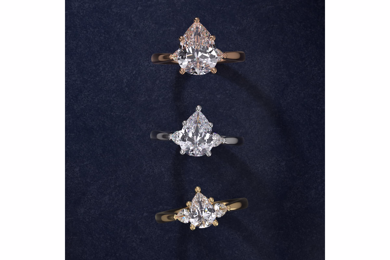 Pear shaped diamond ring in yellow gold solitaire setting showing warm metal against white diamond on Blue Nile