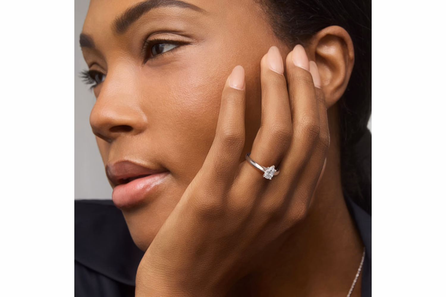 Pear shaped solitaire diamond ring wide band view — Blue Nile white gold
