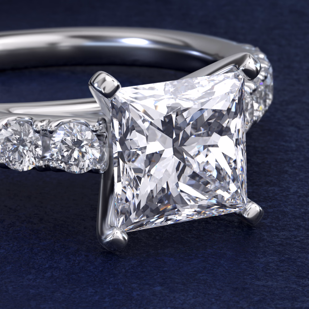 Blue Nile Studio Imperial Micropavé Diamond Engagement Ring in Platinum — princess cut center, premium studio tier with 3/8 ct tw micropavé across cathedral arch and shank