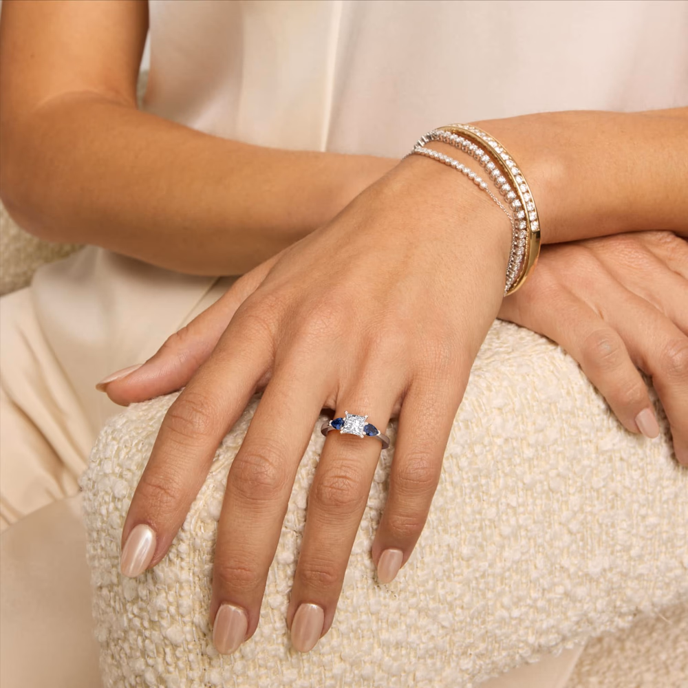 Three-Stone Emerald Cut Diamond Engagement Ring in 14K White Gold — princess cut center with emerald cut step-cut side stones