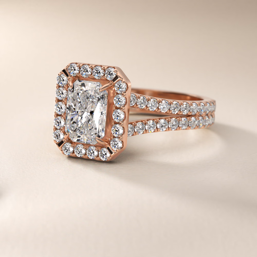 Radiant cut diamond rose gold halo split shank pavé engagement ring product shot